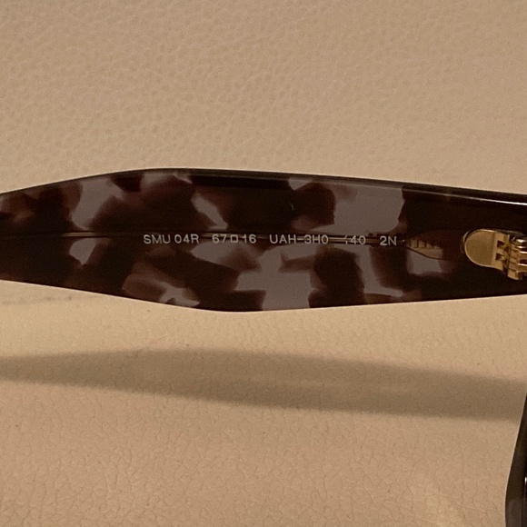 Miu Miu REVEAL Square Eyewear Lilac Havana Frame